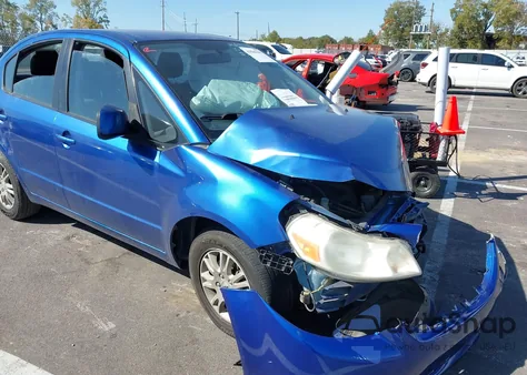 2012 Suzuki Sx4 Le/Le Popular z USA, uszkodzony, nr VIN JS2YC5A34C6305394